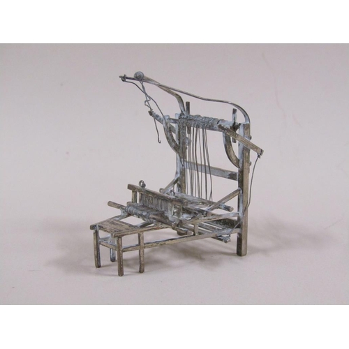 65 - A late 19c/early 20c group of three Chinese silver miniatures comprising a weaving loom, farmer cult... 