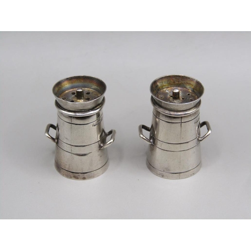 74 - A pair of silver miniature pepperette milk churns, Birmingham 1938, each 2.6 cm h.