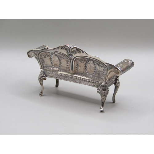 79 - An early 20c Continental silver miniature two seater sofa with scrolling arms and cabriole legs and ... 