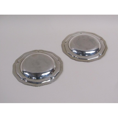 107 - A pair of late Victorian shallow silver dishes with gadroon cast raised rims, makers mark for Charle... 