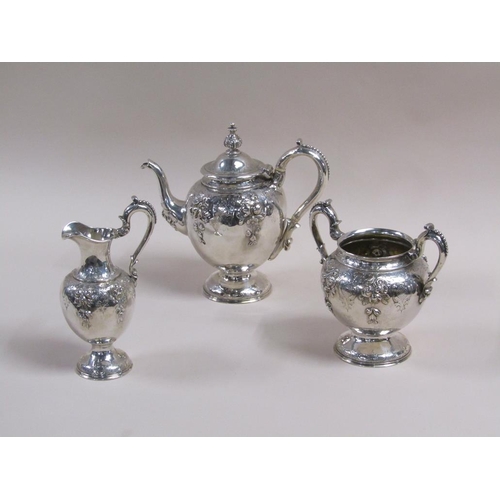 108 - A mid 19c three piece silver tea service, embossed and chased with leaf and flowers, makers mark for... 