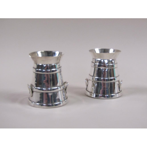 113 - Two early 20c silver plate cream cans vesta pots, each 9cm h.