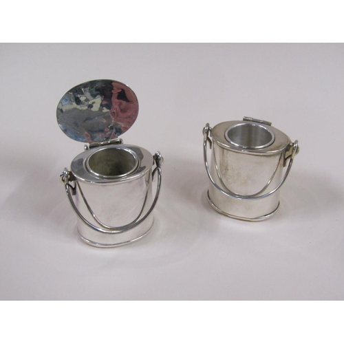 114 - A pair of early 20c silver plate milk churn vesta pots, each 7cm h.