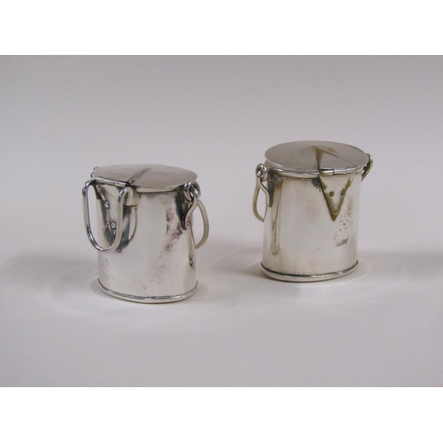 114 - A pair of early 20c silver plate milk churn vesta pots, each 7cm h.