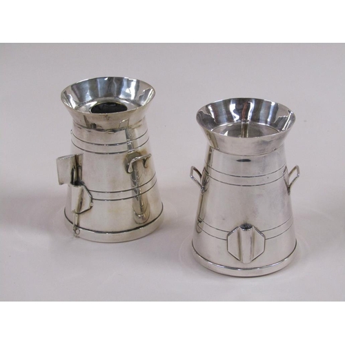 115 - A pair of early 20c silver plate milk churn in the form of a cigar lighter and a spill holder, each ... 