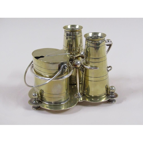 116 - An early 20c silver plate condiment set comprising milk churn shaped salt and pepper and a cream can... 