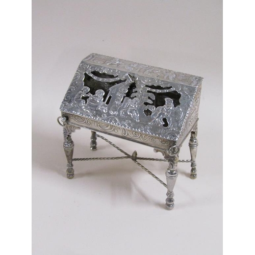 81 - A late 19c Continental silver bureau de dame, chased pierced and embossed with a church and classica... 