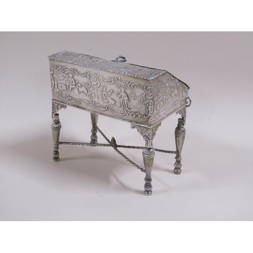 81 - A late 19c Continental silver bureau de dame, chased pierced and embossed with a church and classica... 