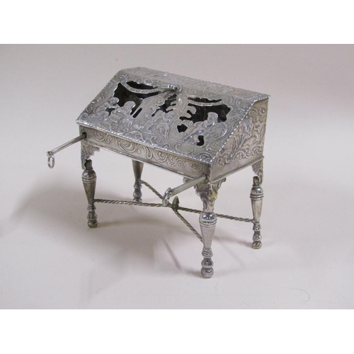 81 - A late 19c Continental silver bureau de dame, chased pierced and embossed with a church and classica... 