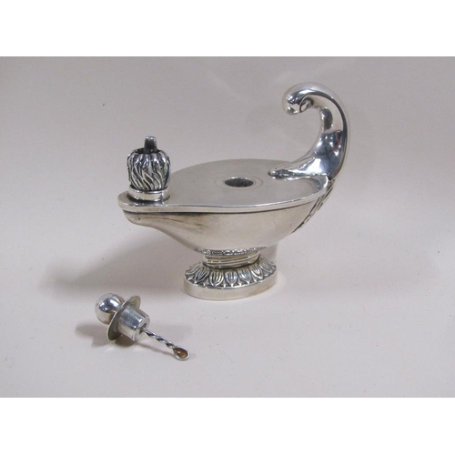 82 - A Victorian Aladdin type table lighter, marks rubbed, 6.1ozt, 12cm w.