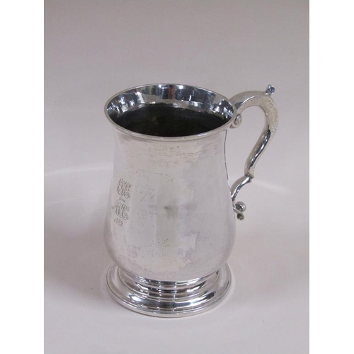 83 - A George III baluster tankard with double scroll handle, makers mark for John Lambe, 10ozt, London 1... 