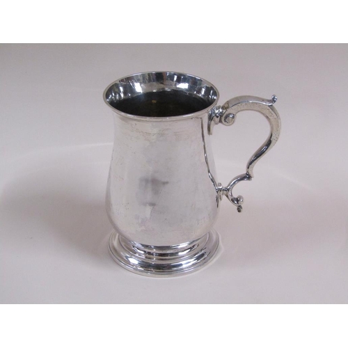 83 - A George III baluster tankard with double scroll handle, makers mark for John Lambe, 10ozt, London 1... 