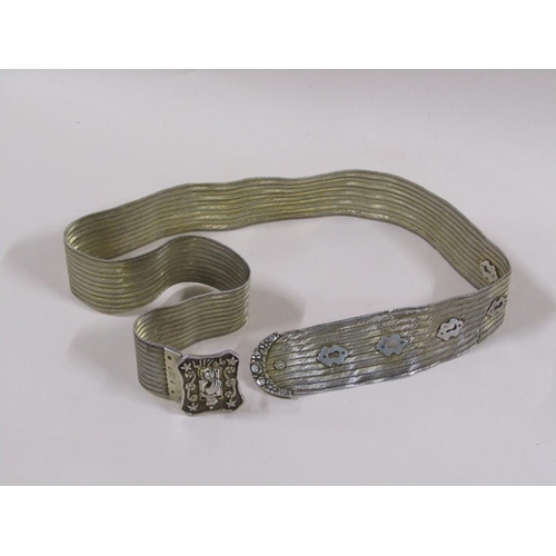 86 - A Turkish silver belt, the buckle face cast with a hand and rose, 13.6ozt, 95cm l.