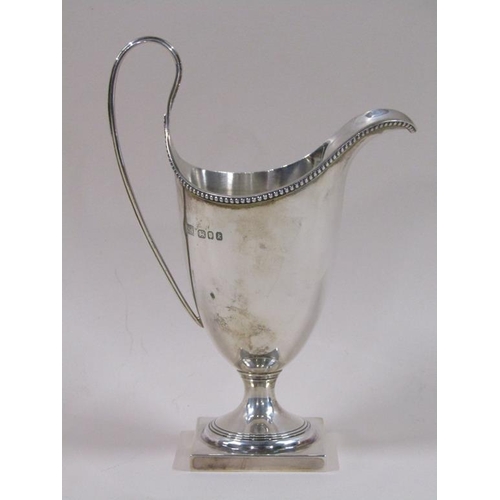 87 - A late Georgian style silver cream jug, London 1966, 3.8ozt, 15.5cm h.