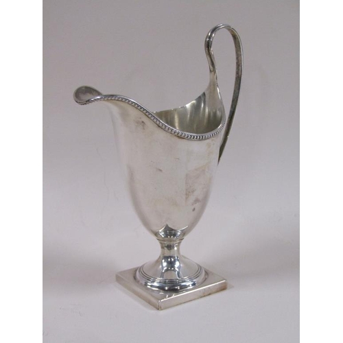 87 - A late Georgian style silver cream jug, London 1966, 3.8ozt, 15.5cm h.