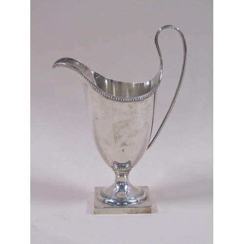 87 - A late Georgian style silver cream jug, London 1966, 3.8ozt, 15.5cm h.