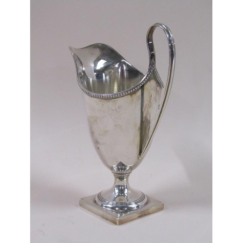 87 - A late Georgian style silver cream jug, London 1966, 3.8ozt, 15.5cm h.