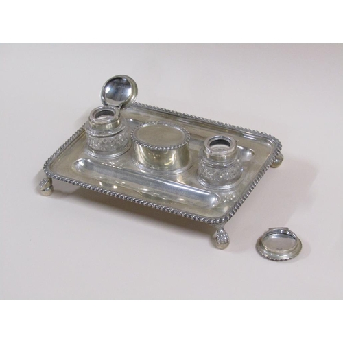 93 - An early 19c silver two bottle ink stand with a central lidded seal box, the stand with two pen tray... 