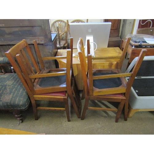 693 - FOUR EDWARDIAN OAK DINING CHAIRS