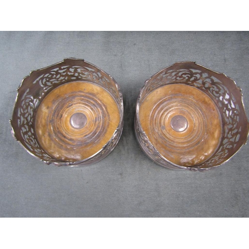 1506 - PAIR OF SHEFFIELD PLATE WINE BOTTLE COASTERS WITH TURNED WOODEN BASES, 14CM DIAM