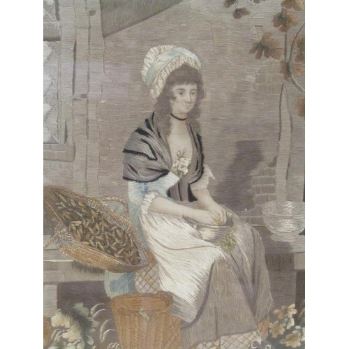 1120A - 19c SILKWORK OVAL PICTURE OF LADY SITTING ON A GARDEN BENCH, OVAL F/G 43 x 35 cms