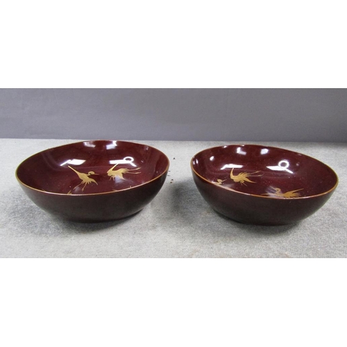 1298 - PAIR OF ORIENTAL LACQUERED BOWLS, GILT DECORATED WITH BIRDS, 11CM W