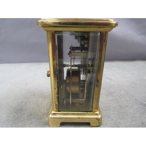 1299 - BRASS CASED CARRIAGE CLOCK, 12CM H