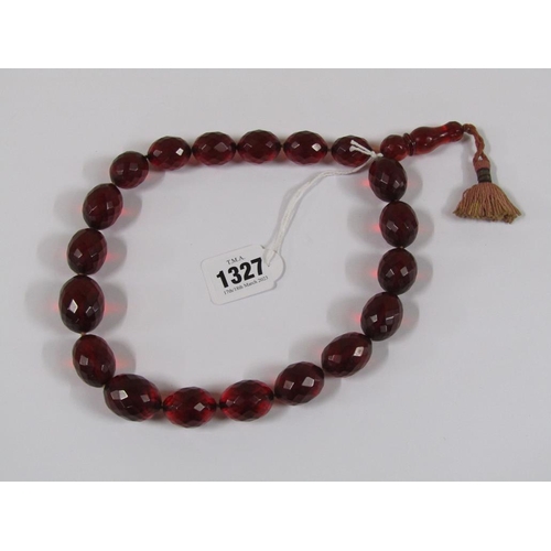 1327 - STRING OF CUT CHERRY AMBER TYPE BEADS, 52CM L