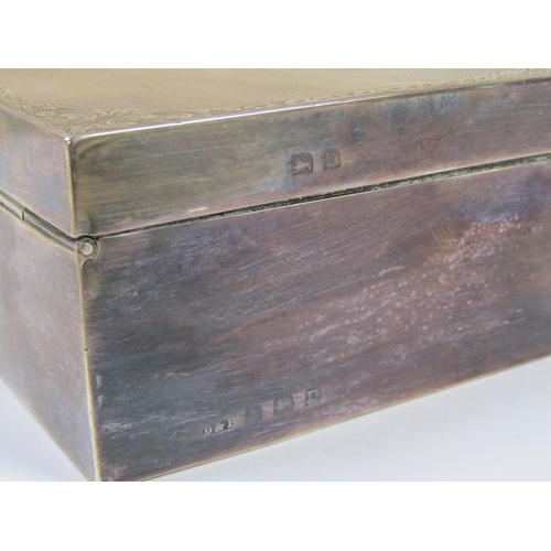 1330 - SILVER PRESENTATION CIGARETTE BOX WITH CHASED AND ENGINE TURNED DECORATION, 13CM W