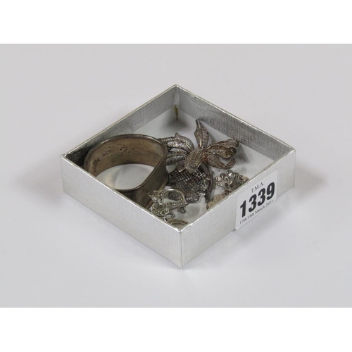 1339 - THREE MARQUEZITE  AND SILVER STONE SET BROOCHES; SILVER NAPKIN RING