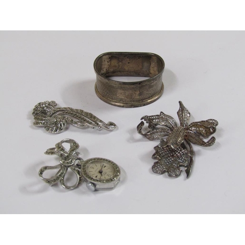 1339 - THREE MARQUEZITE  AND SILVER STONE SET BROOCHES; SILVER NAPKIN RING