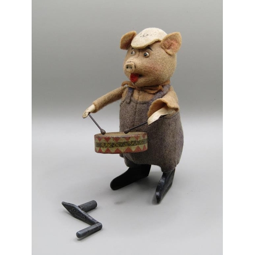 1344 - SCHUCO DRUMMING PIG IN ORIGINAL COSTUME, IN WORKING ORDER, 12CM H