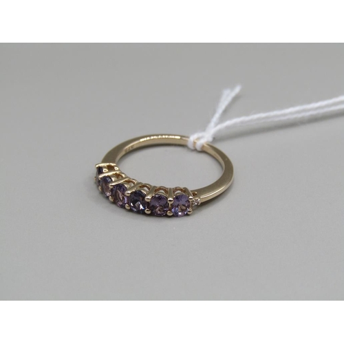 1438 - GOLD PURPLE SPINEL RING, SIZE N