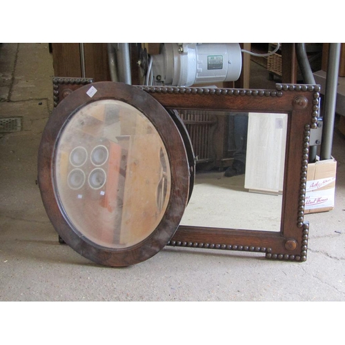 556 - TWO OAK FRAMED MIRRORS