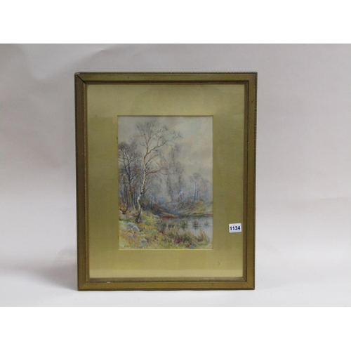 1134 - J CLINTON JONES - WOODLAND POND WITH COTTAGE IN DISTANCE, SIGNED WATERCOLOUR, F/G, 34CM X 24CM