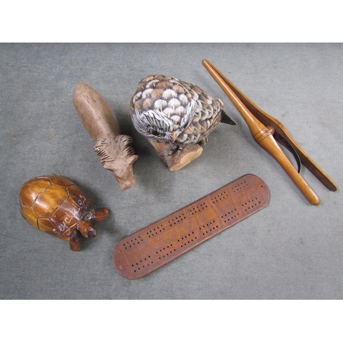 1313 - CARVED WOODEN OWL, LION, GLOVE STRETCHERS ETC