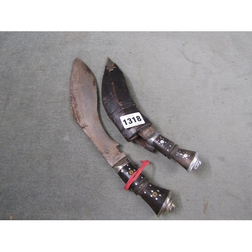 1318 - TWO KUKRI KNIVES, 29CM H LARGEST