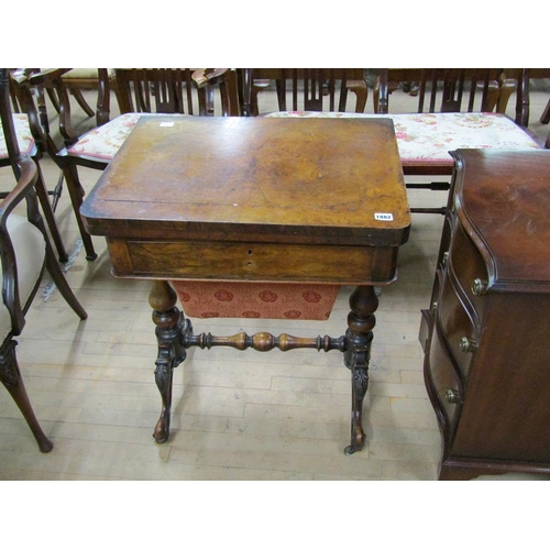 1882 - VICTORIAN FIGURED WALNUT VENEERED METAMORPHIC FOLD OVER GAMES TABLE/NEEDLEWORK BOX ON CARVED REFECTO... 