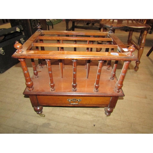 1885 - 19C MAHOGANY THREE DIVISION CANTERBURY WITH SPINDLED DIVISIONS, HAVING A BASE DRAWER, 53CM W, 52CM H