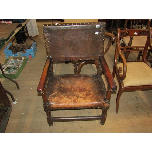 1892 - LATE 17C/EARLY 18C OAK FRAMED STUDDED LEATHER UPHOLSTERED OPEN ARMCHAIR