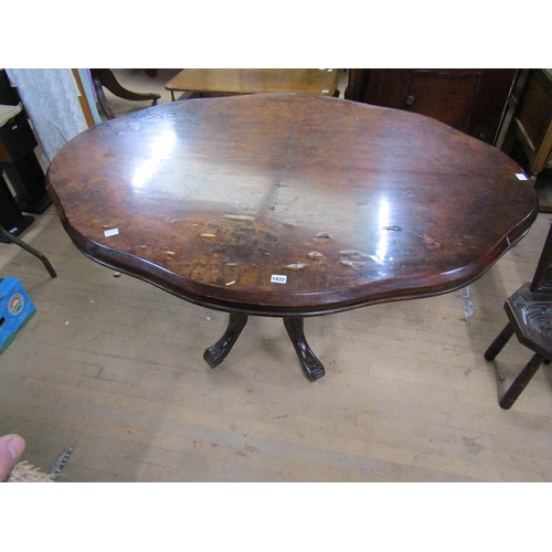 1932 - FIGURED WALNUT VENEERED SERPENTINE PEDESTAL BREAKFAST TABLE, 140CM W, 75CM H