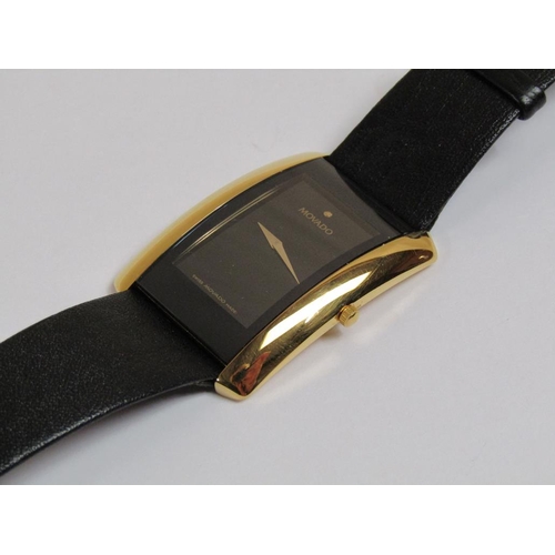 1589 - MOVADO GENTS WATCH WITH CURVED CASE AND BLACK LEATHER STRAP