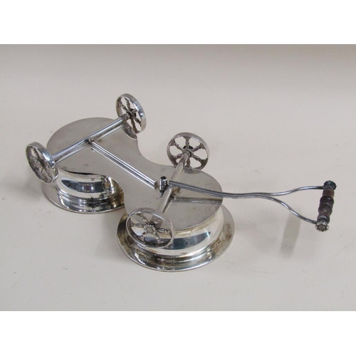 1719 - SILVER PLATED BOTTLE CARRIAGE WITH TWO TURNED WOOD BASE COASTERS ON A FOUR WHEEL TROLLEY, OVERALL 34... 