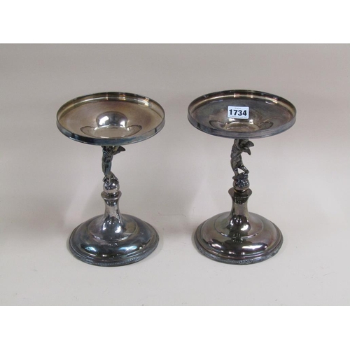 1734 - PAIR OF SILVER PLATE COMPORT STANDS WITH CHERUB COLUMNS, 22CM H