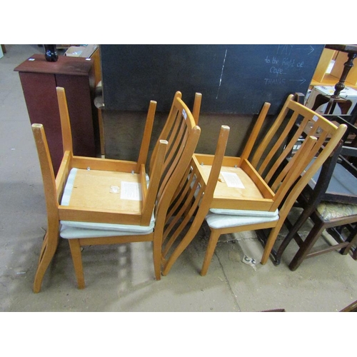 671 - FOUR BEECH DINING CHAIRS