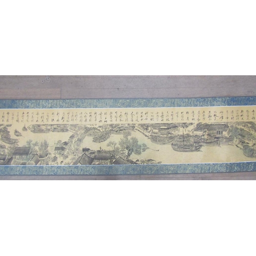 1129 - TWO ORIENTAL ITEMS - ROLLED SCROLL, PRESENTATION PLAQUE, AND MUISICAL PIANO