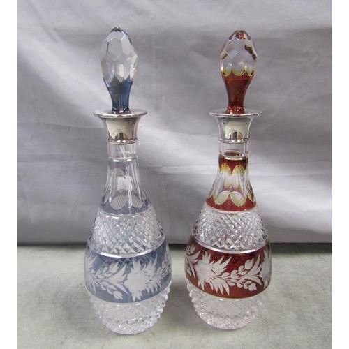 1536 - CRYSTAL DECANTERS - BLUE AND CRANBERRY WITH SILVER MOUNTS, 38CM H