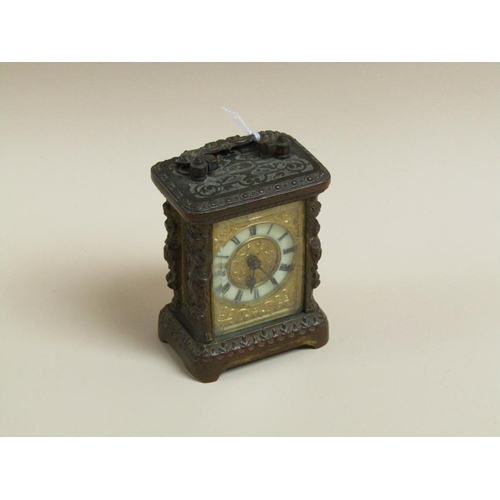 1238 - LATE 19C/EARLY 20C MINIATURE BRASS CASED CARRIAGE CLOCK, 10CM H HANDLE RAISED