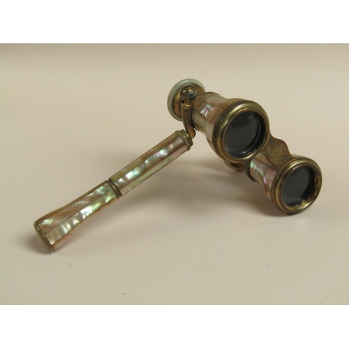 1242 - PAIR OF EDWARDIAN PERIOD FRENCH MOTHER OF PEARL CASED BRASS OPERA GLASSES WITH CARRY HANDLE