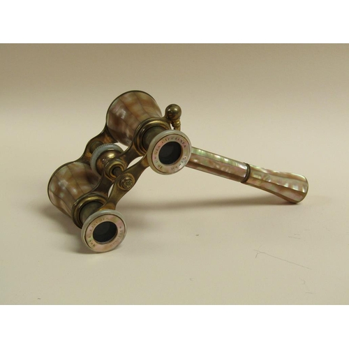 1242 - PAIR OF EDWARDIAN PERIOD FRENCH MOTHER OF PEARL CASED BRASS OPERA GLASSES WITH CARRY HANDLE